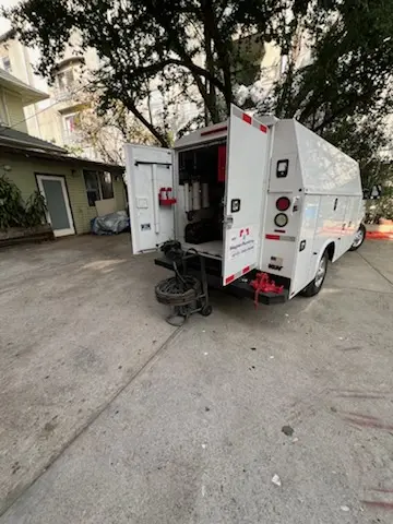 Magnet Plumbing service vehicle on-site for Sewer Line Repair in Harvey